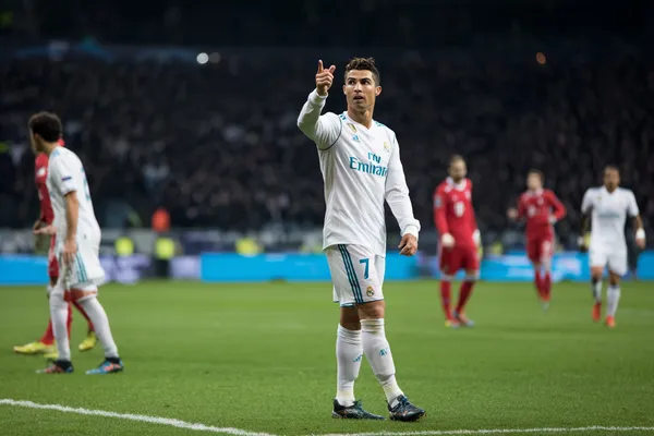 A dramatic shot of winning sevens landing on a slot reel surrounded by shining gold coins, symbolizing big wins.